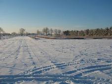 Fields covered with snow.